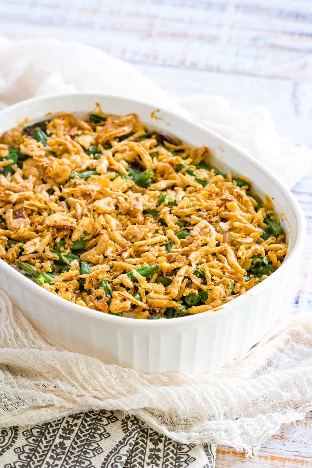 Gluten-free green bean casserole in a large white baking dish.