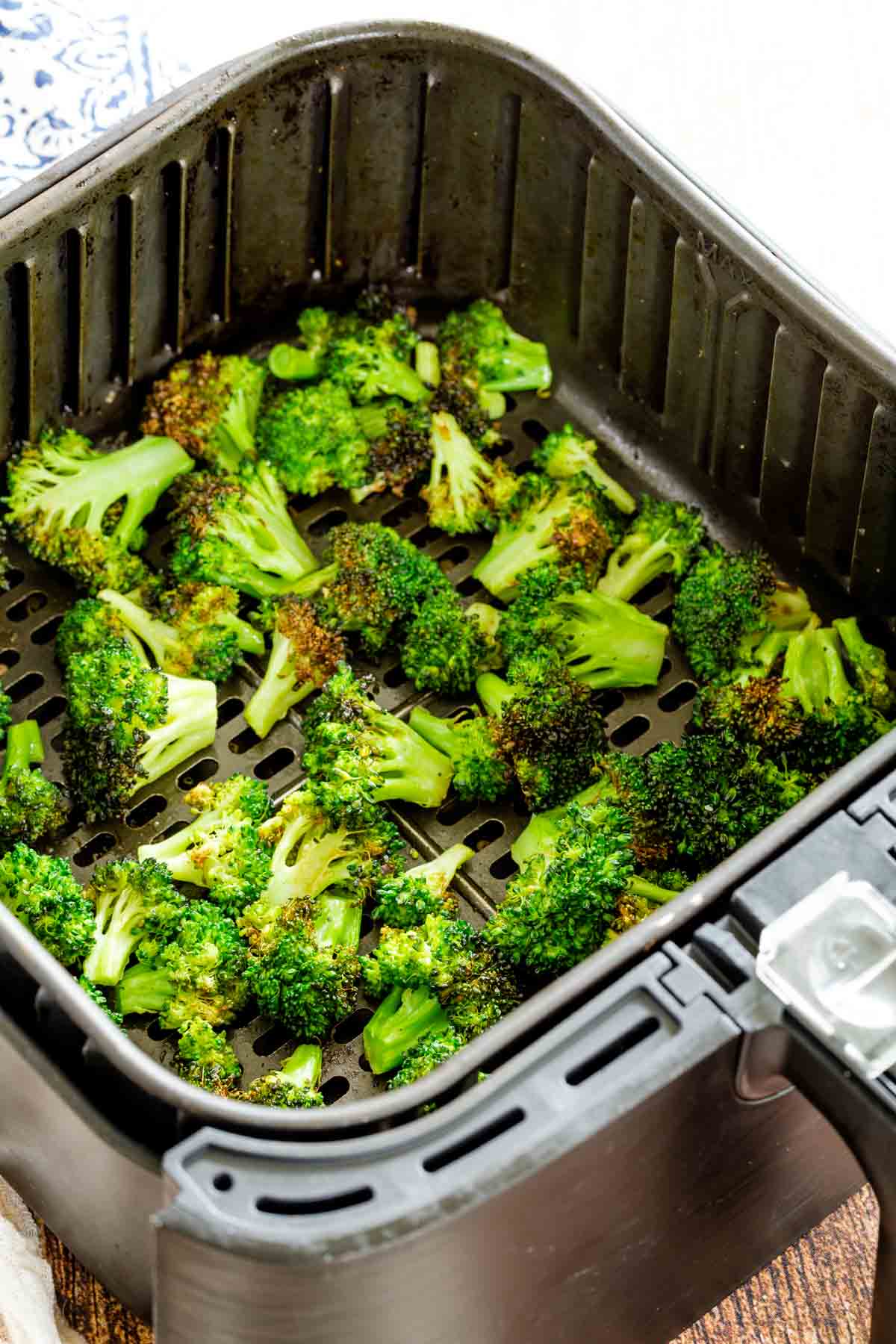 Broccoli inside the air fryer.