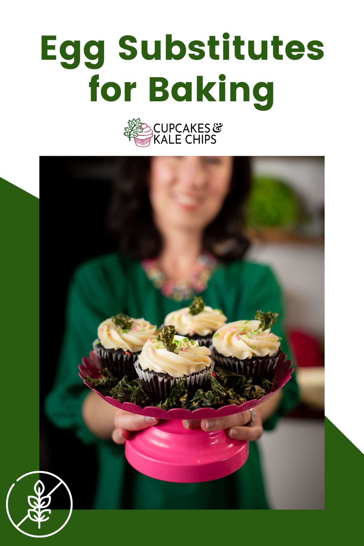 A pink cake stand with four cupcakes on it being held by a woman who is out of focus in the background overlayed on a green and white background with text that says "Egg Substitutes for Baking".