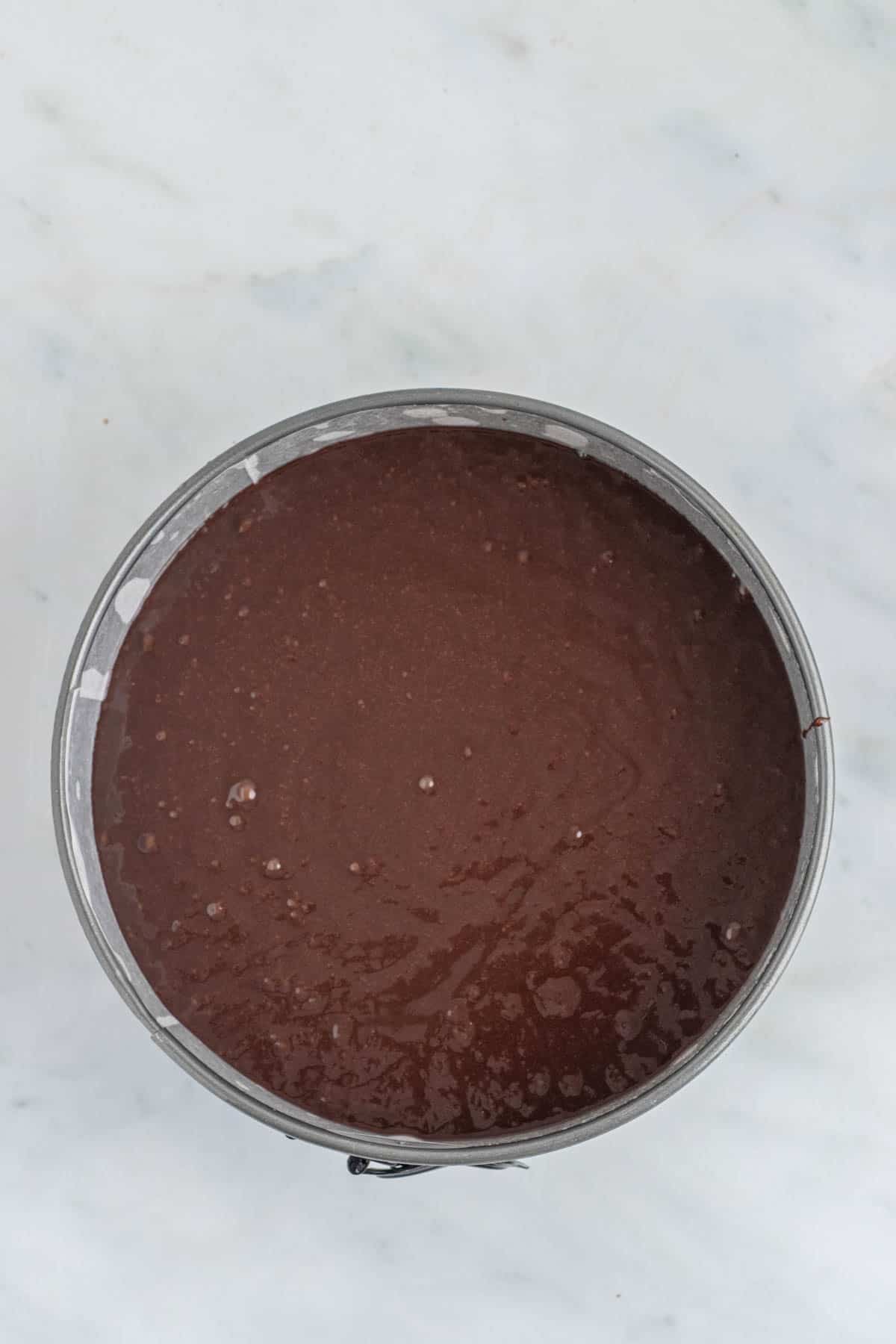 https://cupcakesandkalechips.com/wp-content/uploads/2022/12/How-to-Make-Flourless-Chocolate-Cake-8.jpg