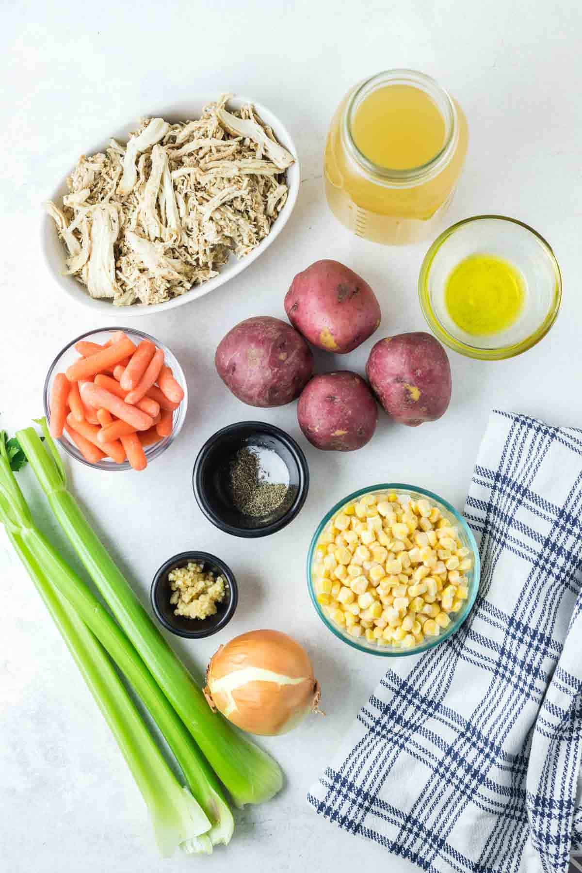 The ingredients for homemade rotisserie chicken soup.