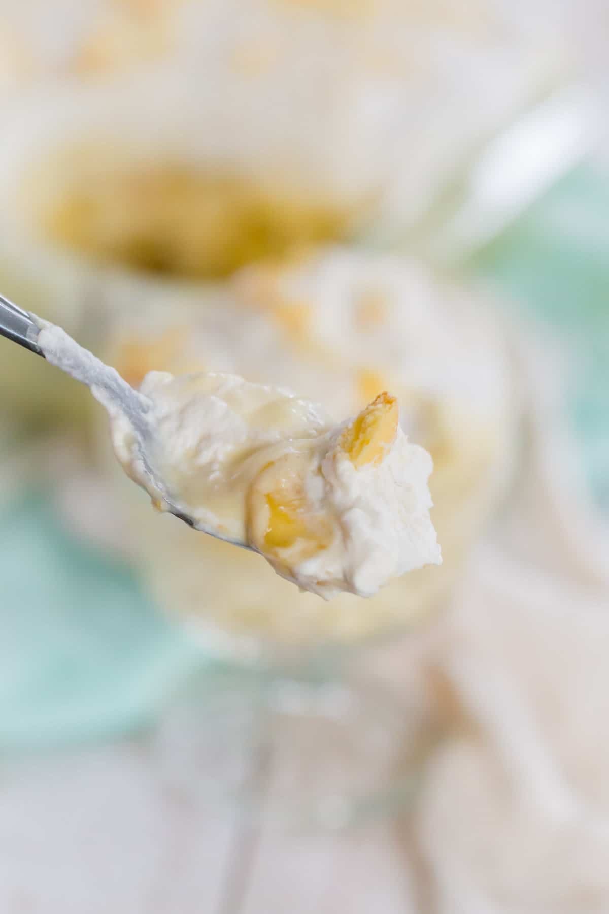 Close up of a spoonful of gluten-free banana pudding.