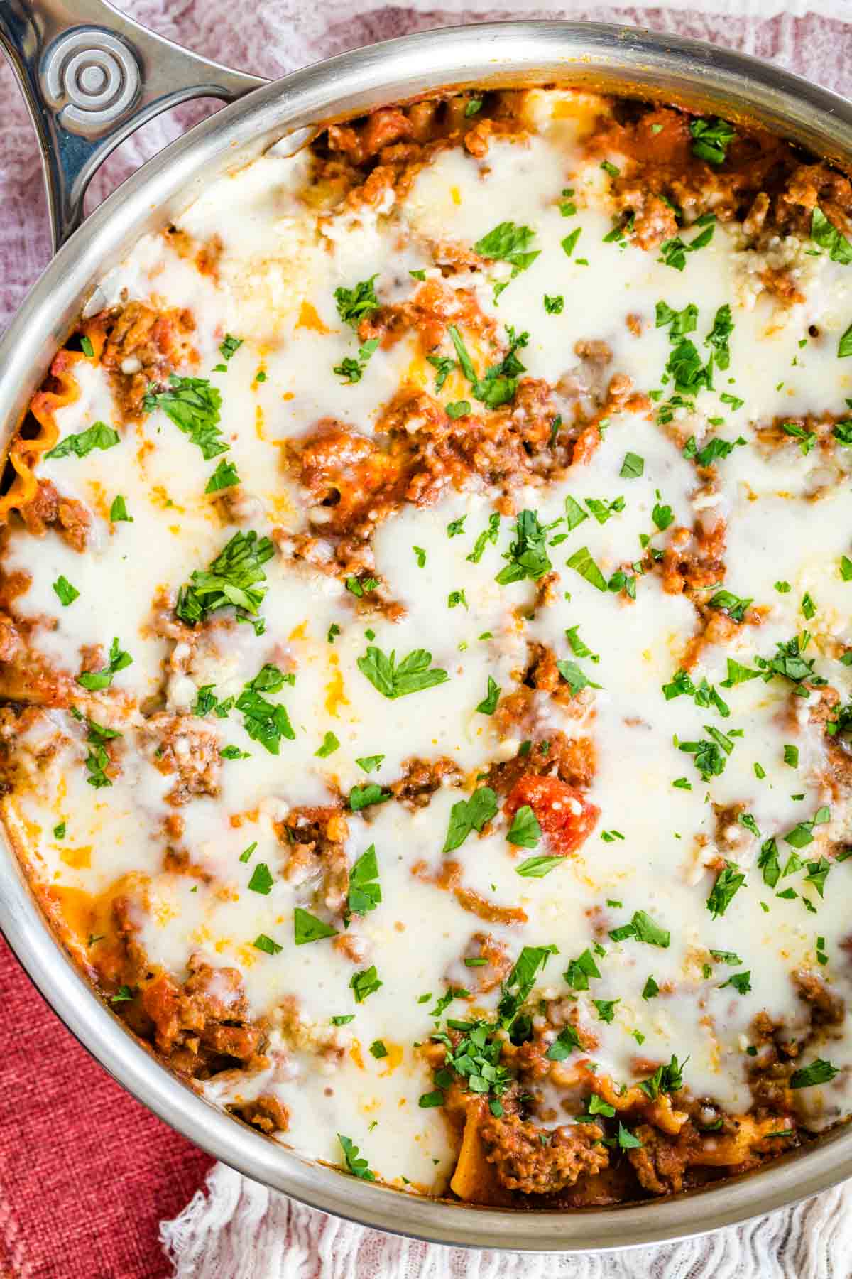 Overhead view of gluten-free lasagna in a skillet.