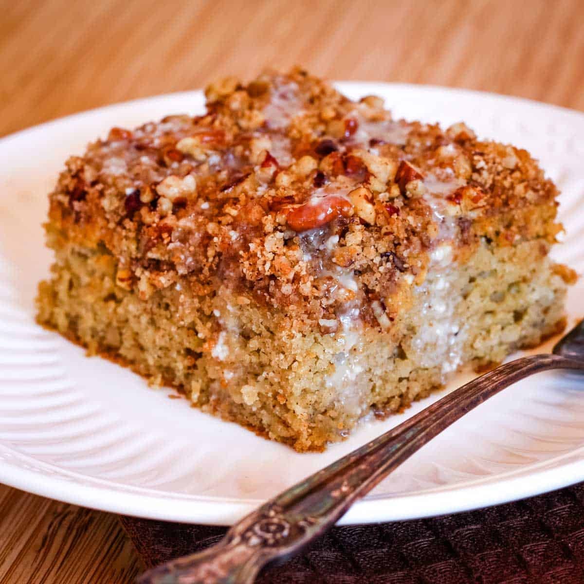 Almond Flour Pumpkin Cake on a small plate with a dessert fork.