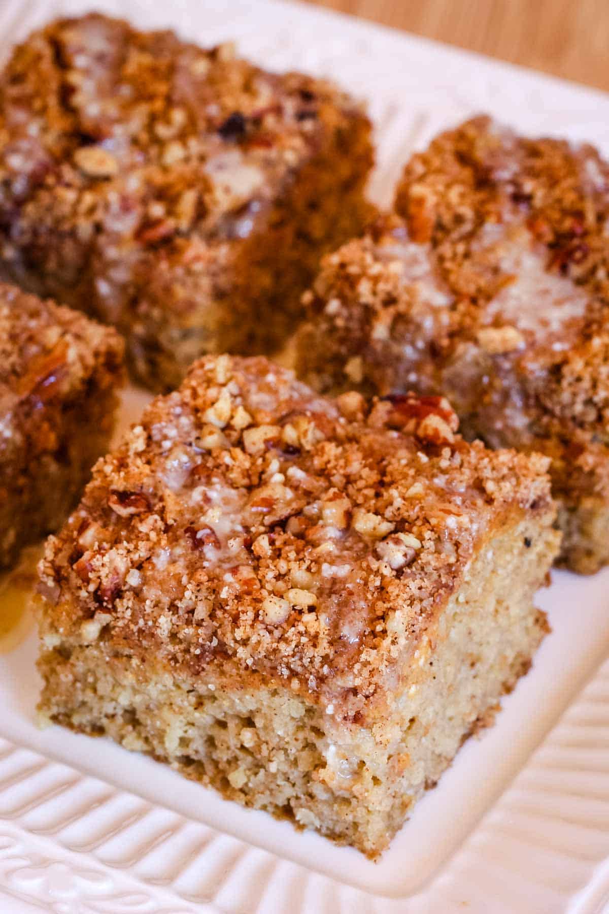 Pieces of almond flour pumpkin cake on a platter.