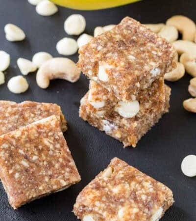Stacks of banana energy bars on a grey countertop.