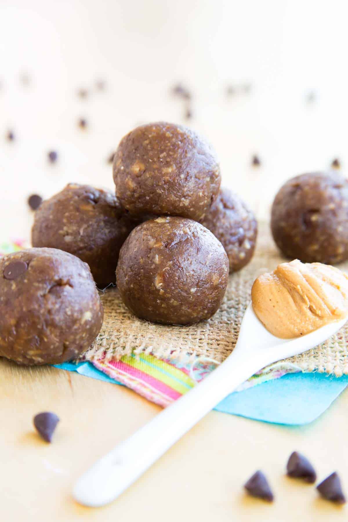 Banana Chocolate Peanut Butter Energy Balls on a piece of burlap.