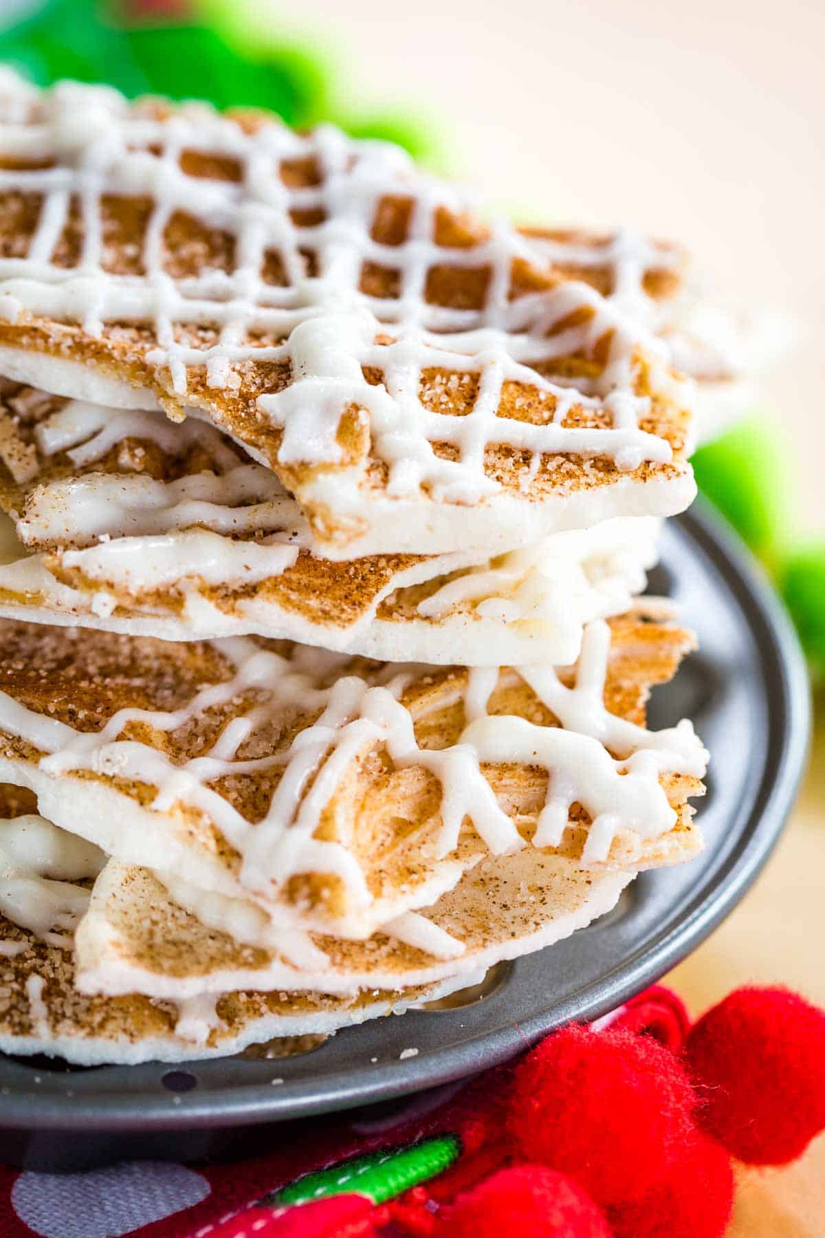 A stack of Cinnamon-Sugar White Chocolate Bark in a small metal pan.