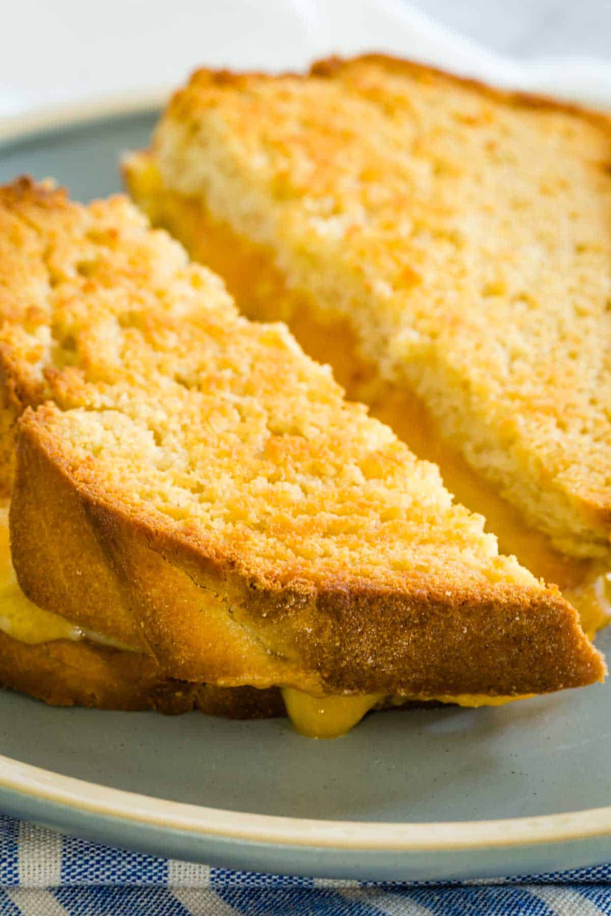 A gluten-free grilled cheese sandwich on a plate.