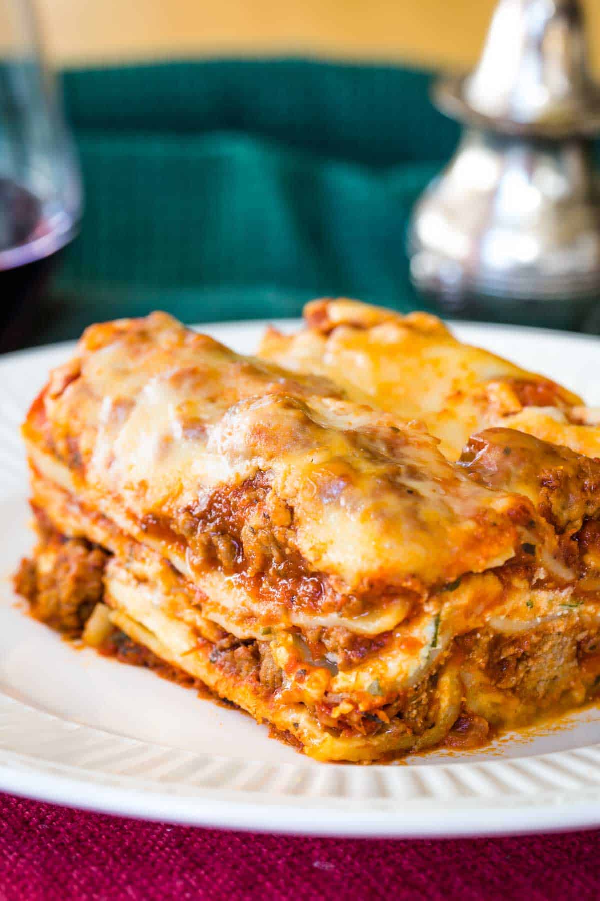 A closeup to show the layers of lasagna noodles, meat sauce, and cheese.