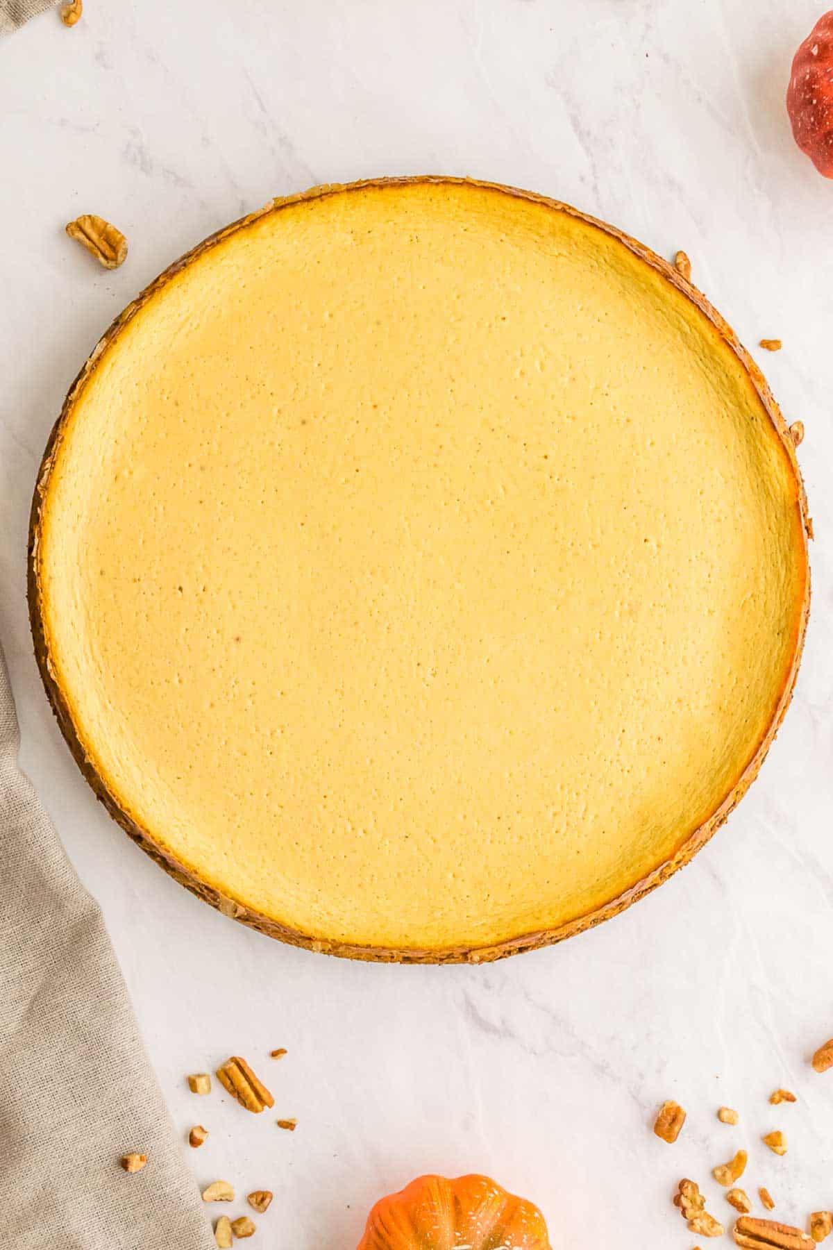 lookiLg down at the whole pumpkin cheesecake tart.