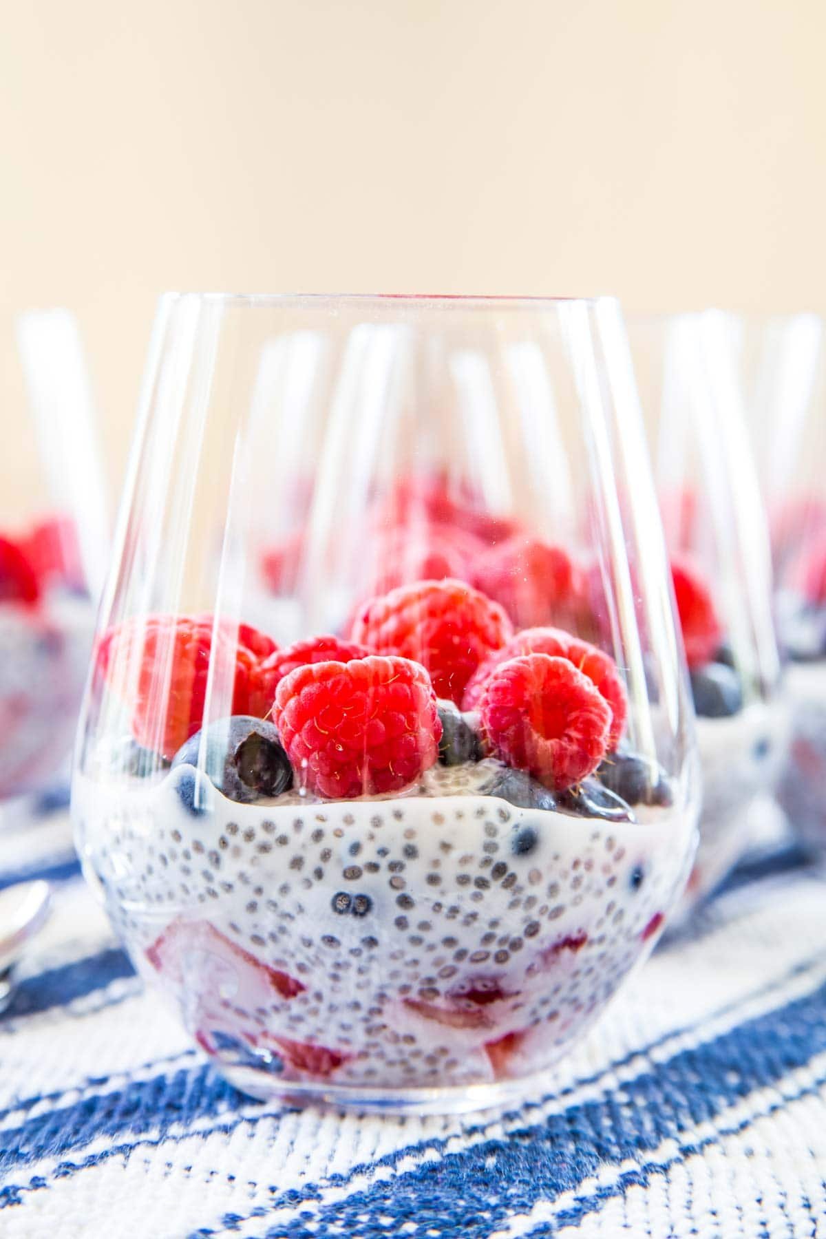 Chia pudding with berries in a glass.
