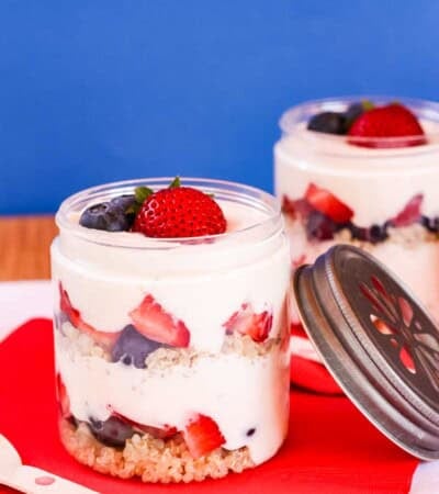 A couple of yogurt parfaits with mixed berries.