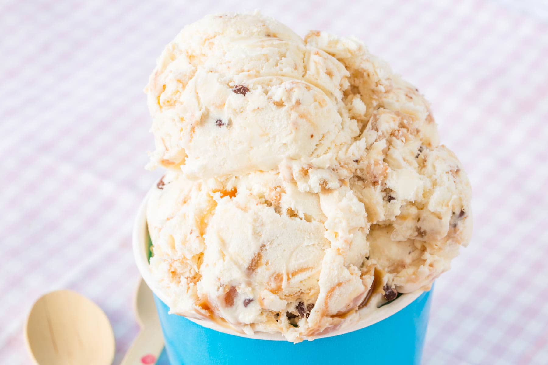 Caramel Toffee Ice Cream in a blue paper bowl.