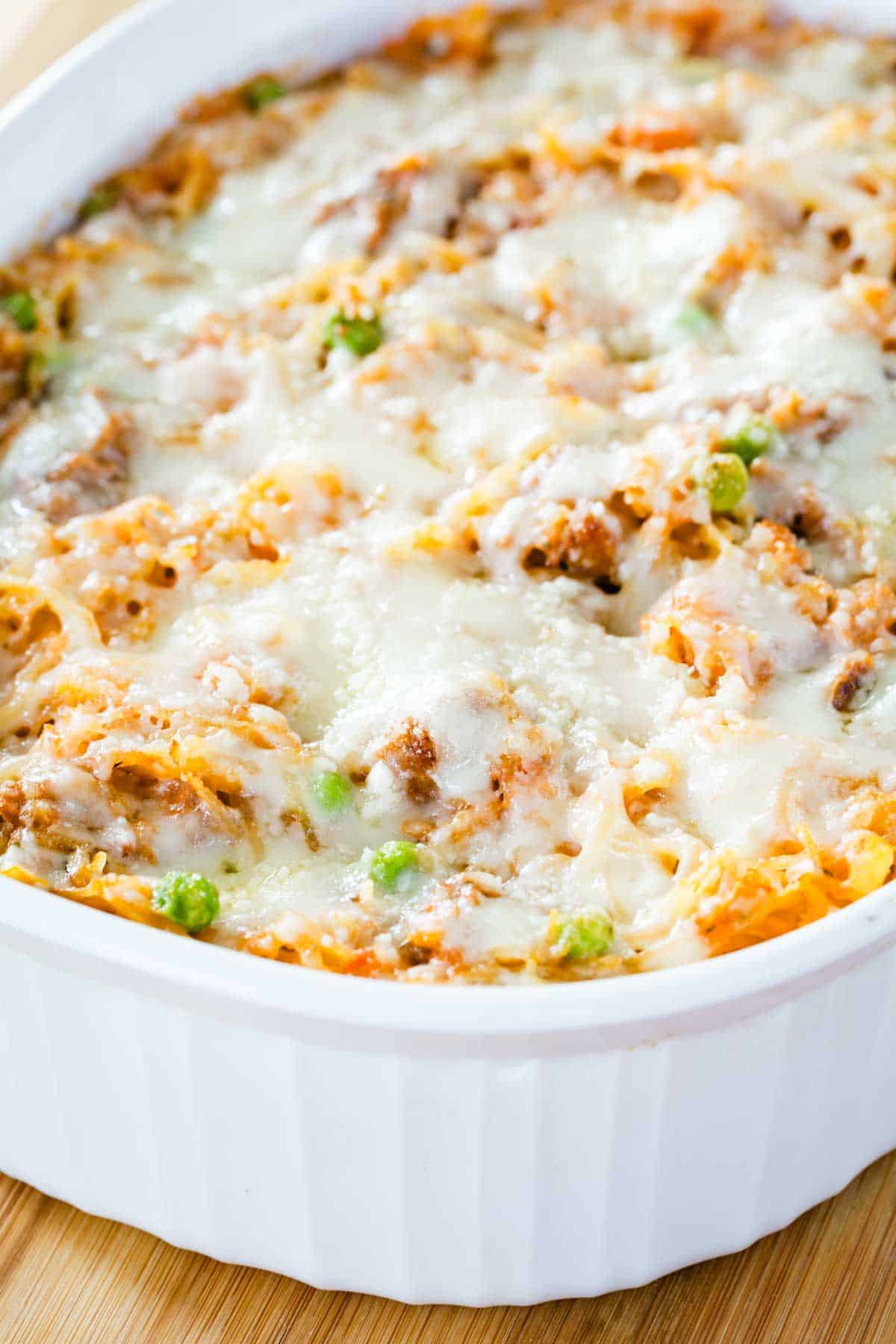 Spaghetti squash casserole in a white ceramic baking dish.