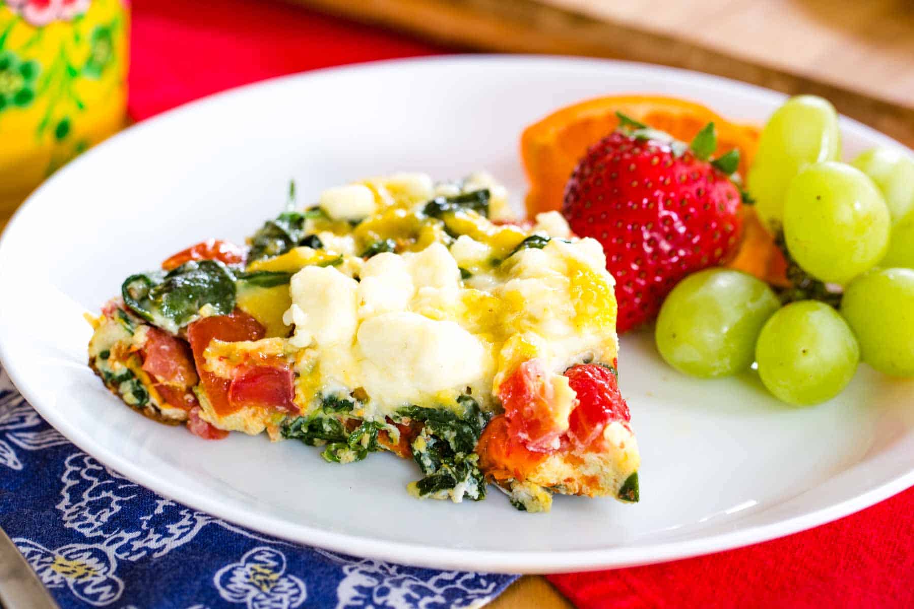 Spinach and Feta Frittata served with fruit for brunch