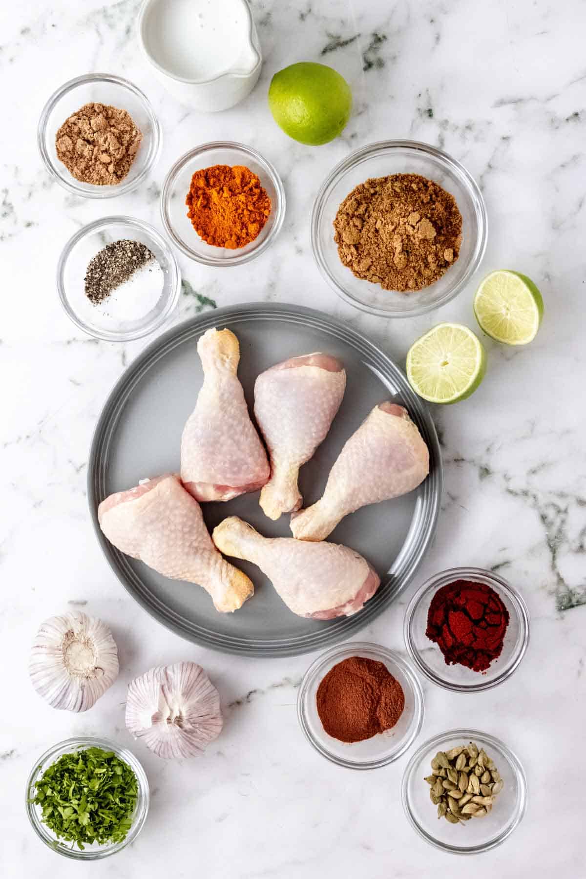 Ingredients needed to make tandoori chicken.