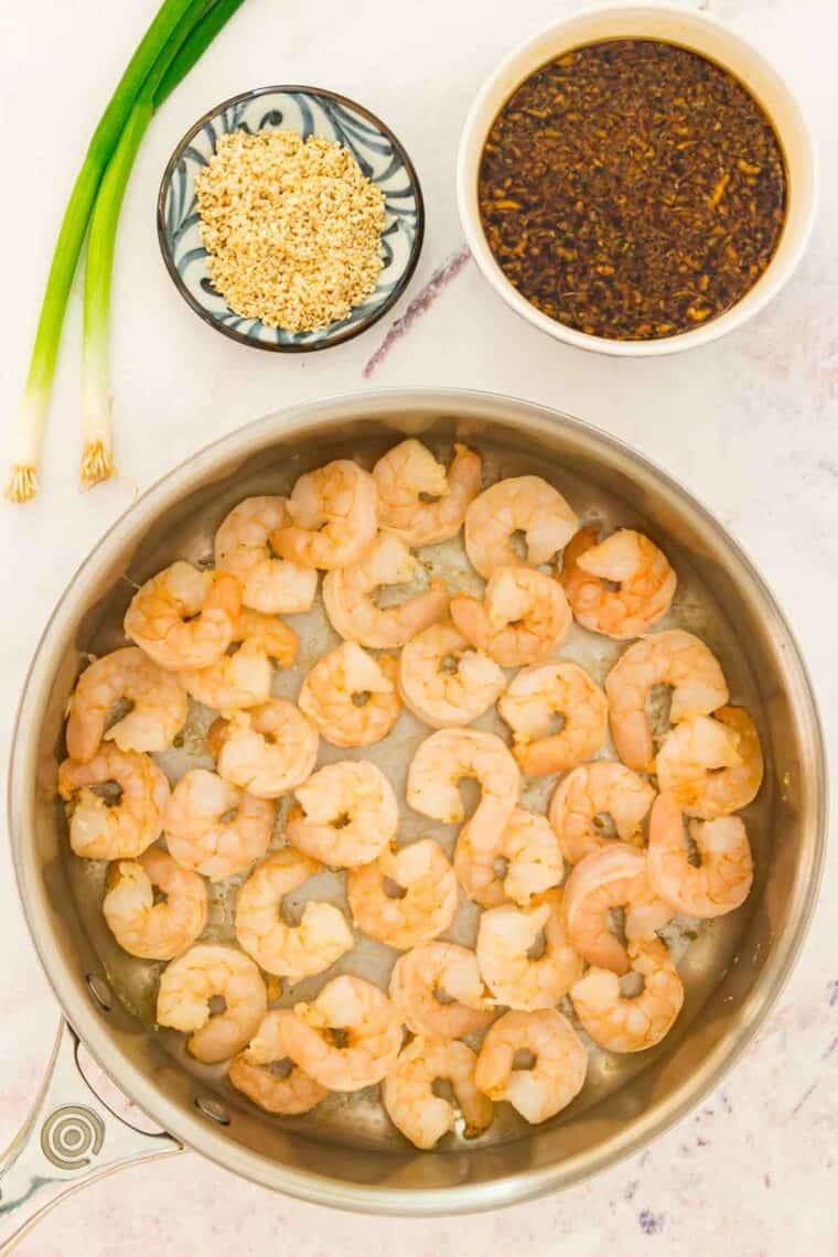 Shrimp cooks in a pan.
