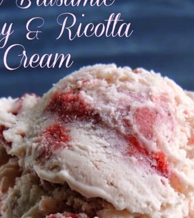 A scoop of roasted strawberry ricotta ice cream.