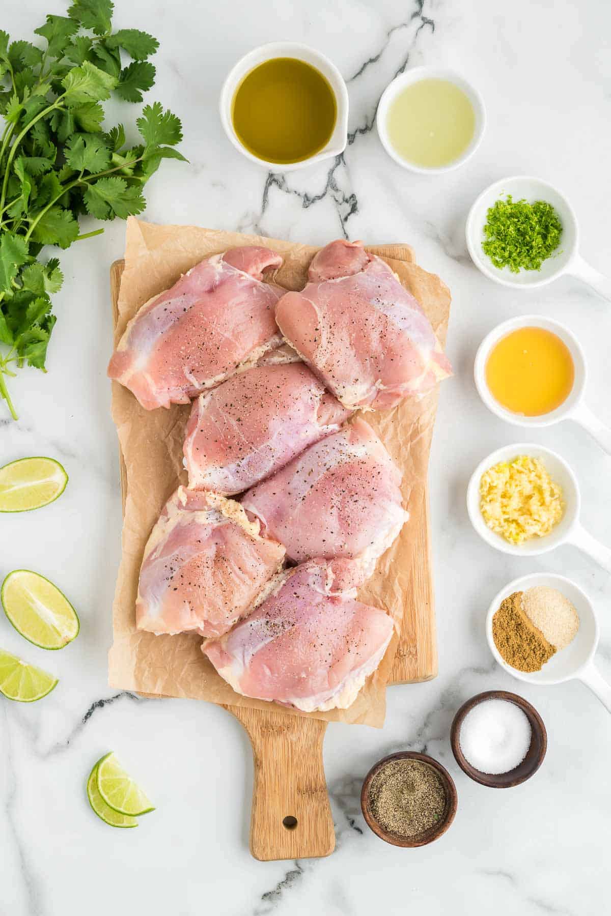 Ingredients needed for cilantro lime chicken - chicken, lime, cilantro, olive oil.
