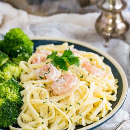 A plate of gluten-free shrimp alfredo.