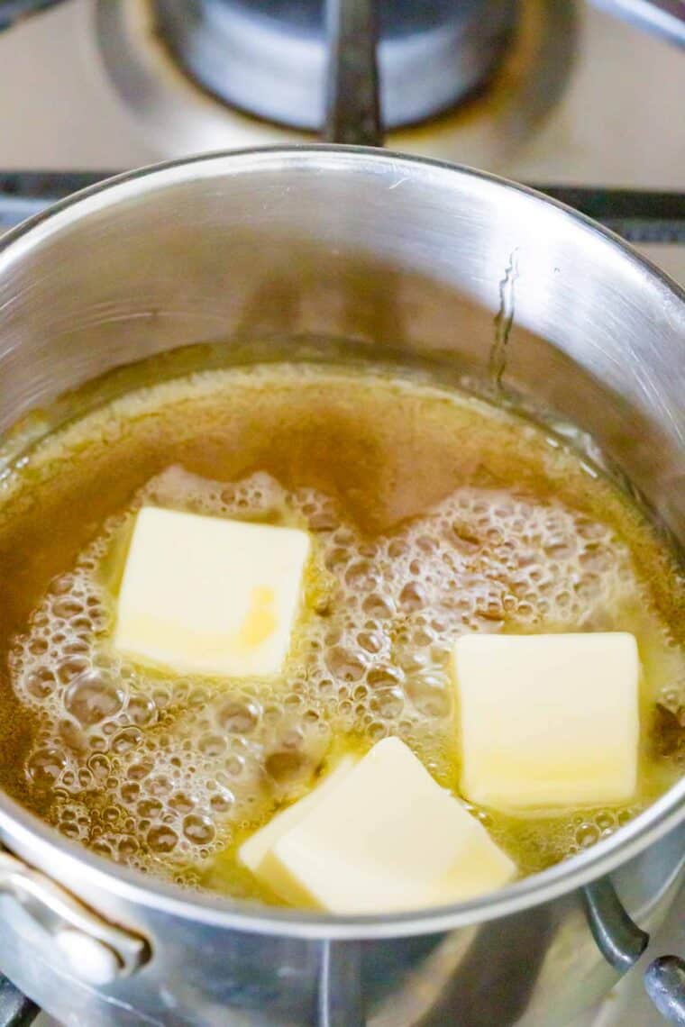 Melting butter in a pan for caramel sauce.