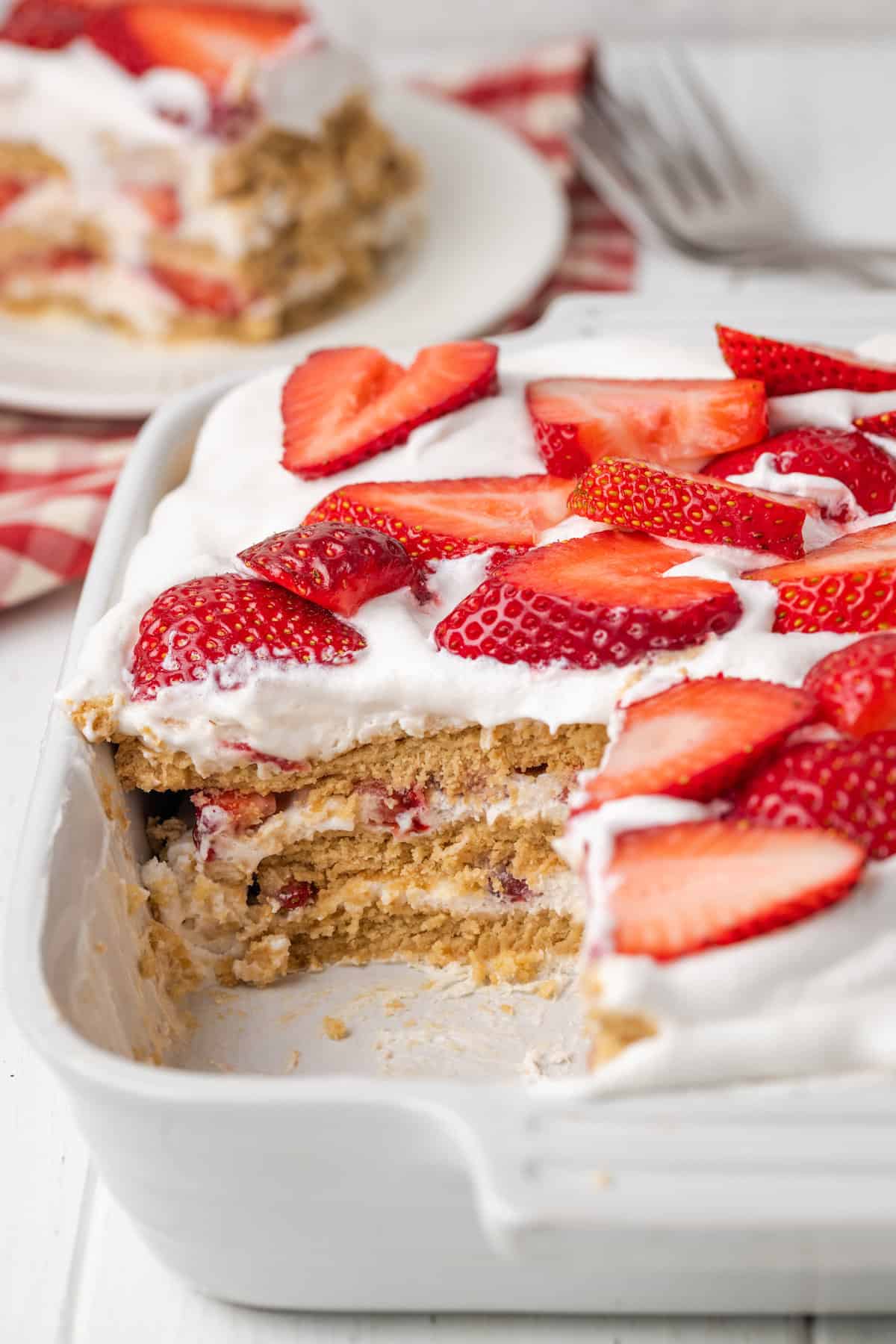 A pan of strawberry icebox cake.