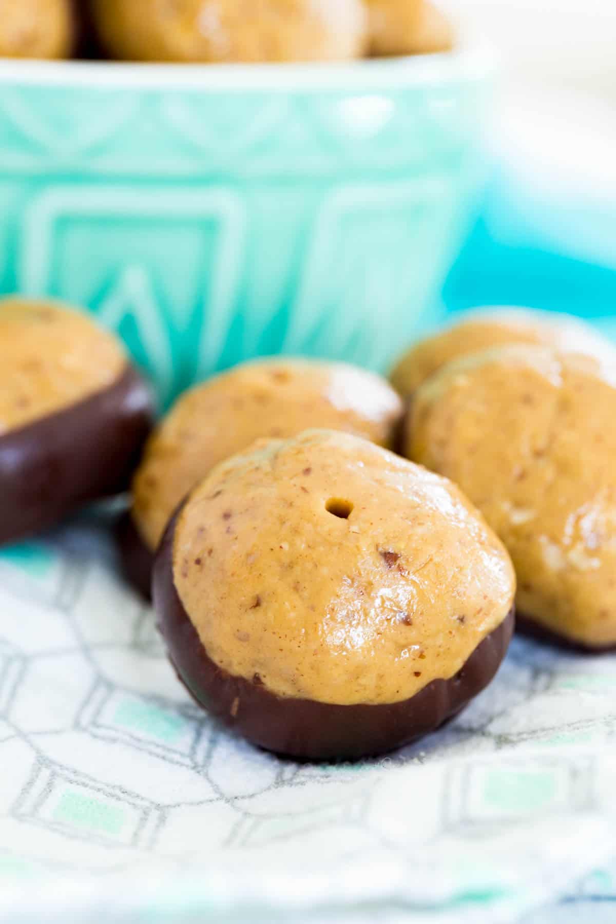 A close up of healthy peanut butter buckeyes.