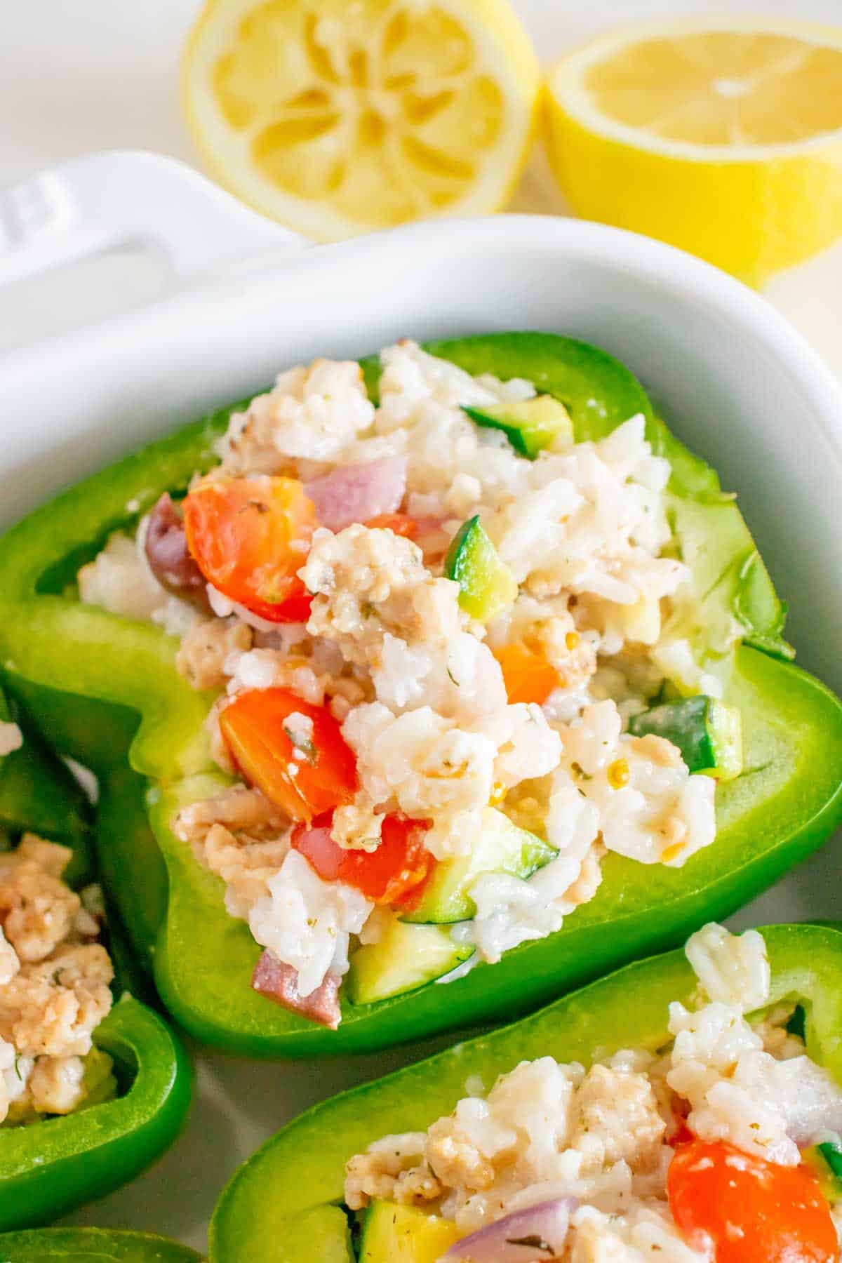 A close up of a chicken stuffed pepper.