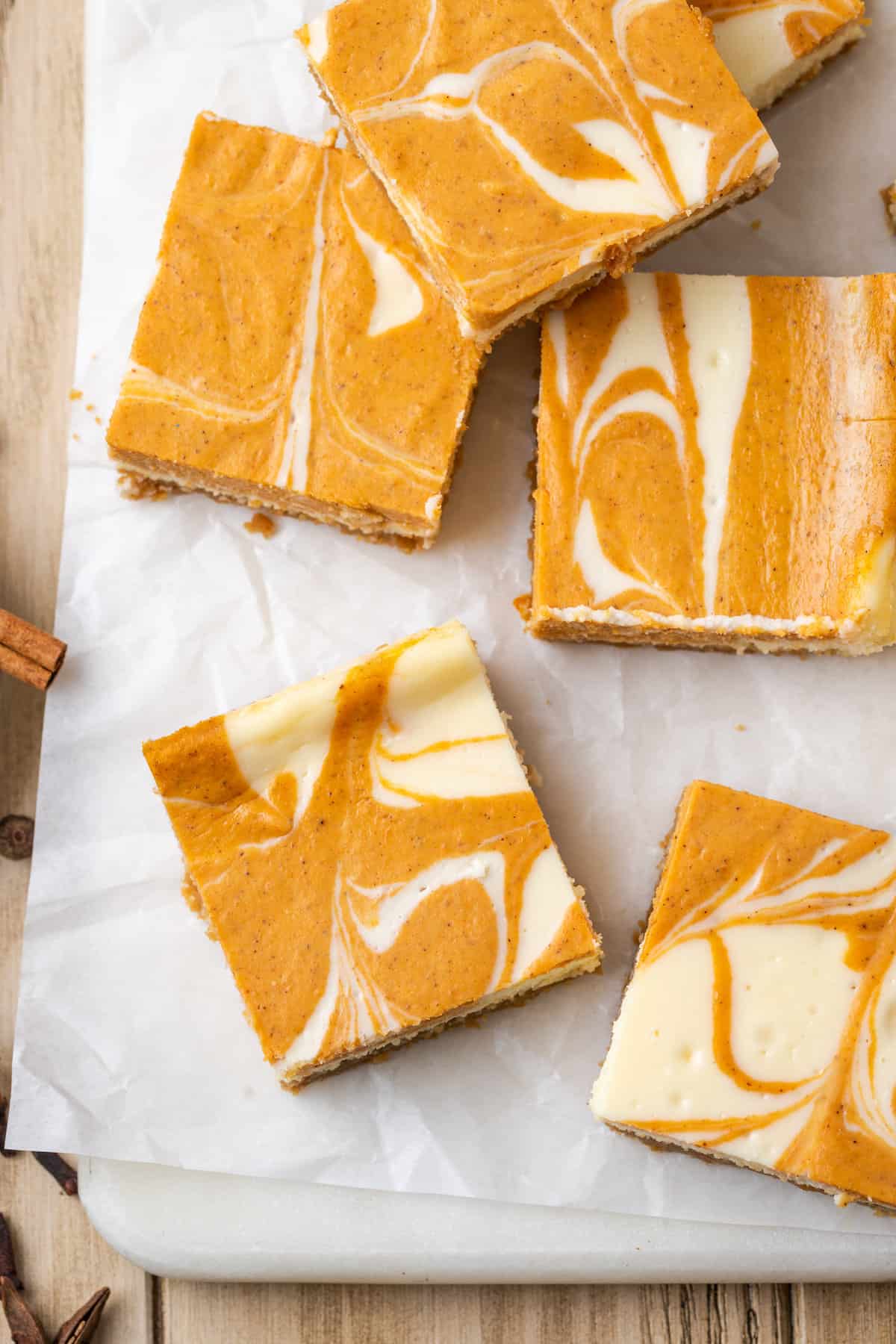 A tray of pumpkin cheesecake bars.