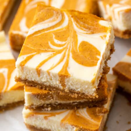 A tray of pumpkin cheesecake bars.