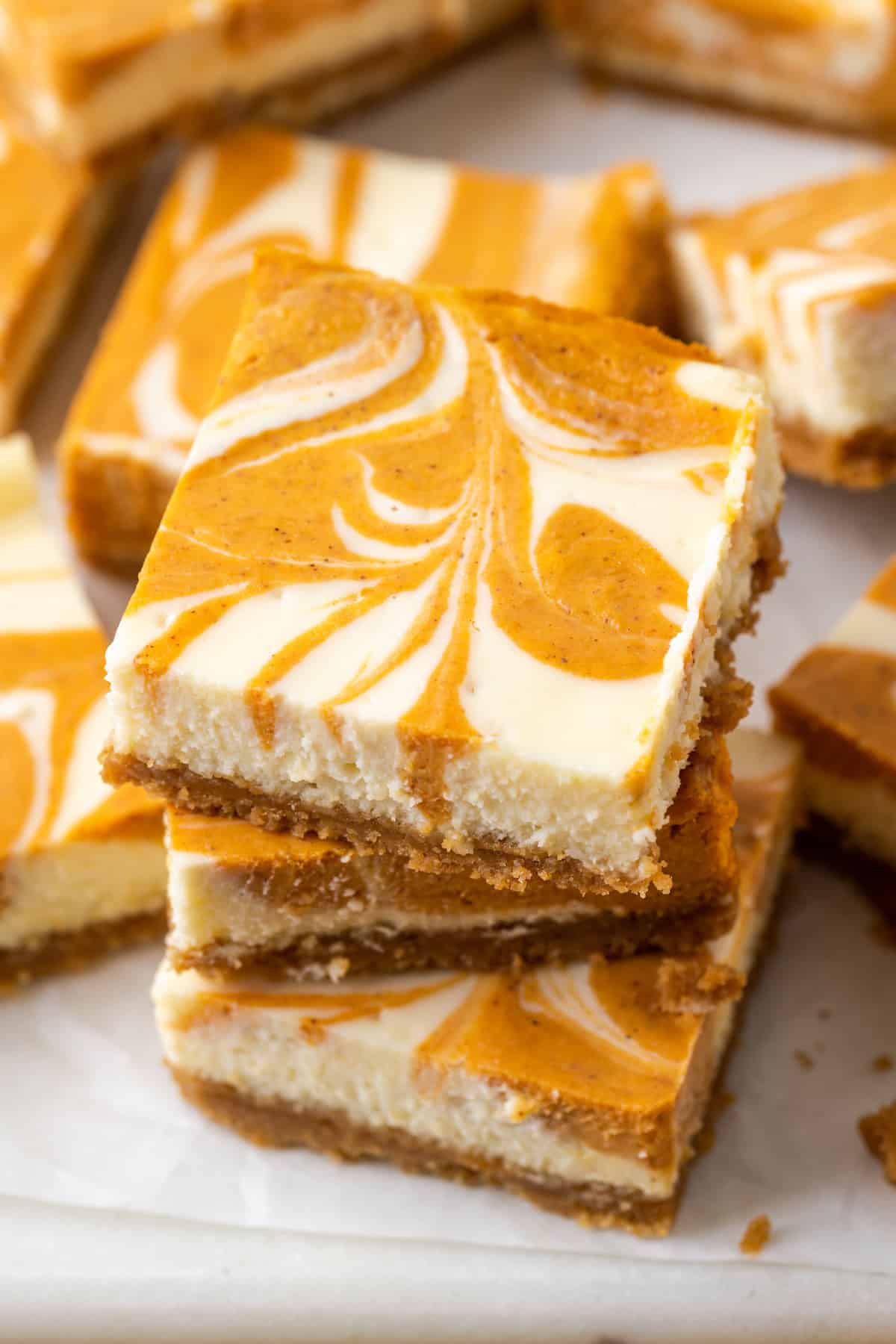 A tray of pumpkin cheesecake bars.