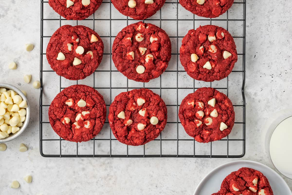 A wire rack of gluten free red velvet cookies.