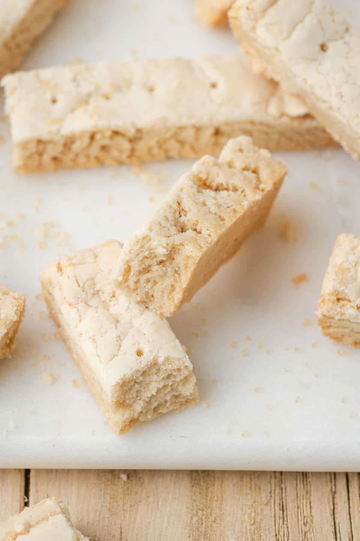 Gluten free shortbread cookies are shown on a white background.