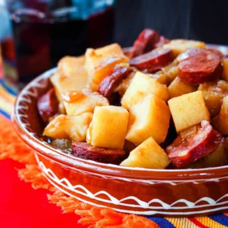 Cubed potatoes and chunks of chorizo are featured in this bowl of patatas riojana.