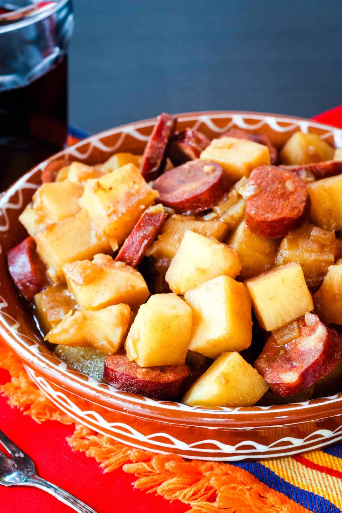 Cubed potatoes and chunks of chorizo are featured in this bowl of patatas riojana.