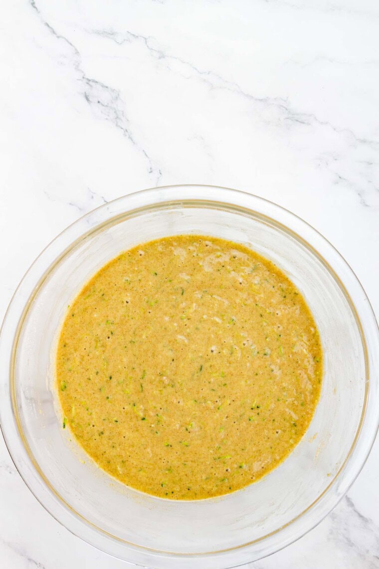 Gluten free zucchini muffin batter in a bowl.