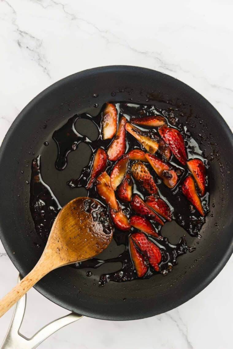 Strawberries cook down in the balsamic glaze.