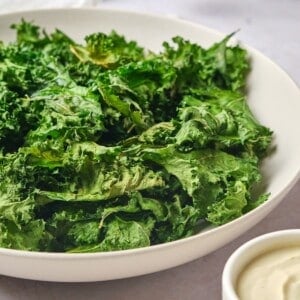 A bowl of kale chips.