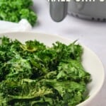 A bowl of kale chips with text overlay that says "Air Fryer Kale Chips".