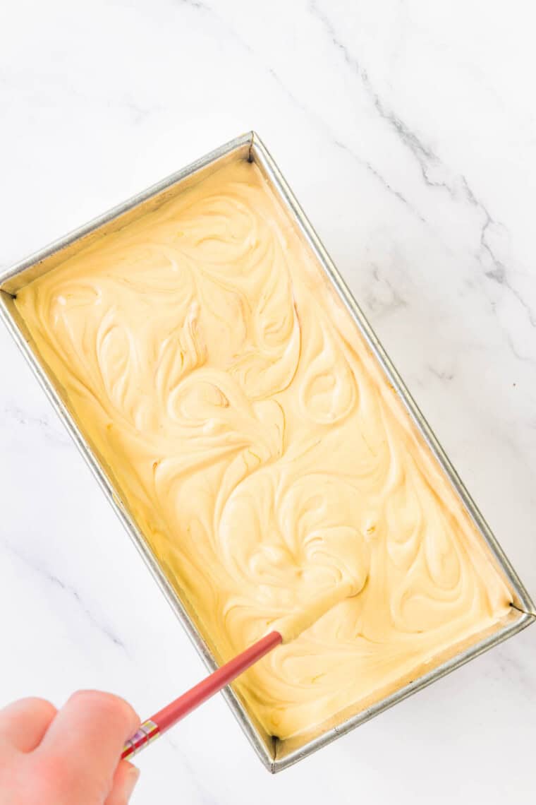 Dulce de leche is swirled into the ice cream base.