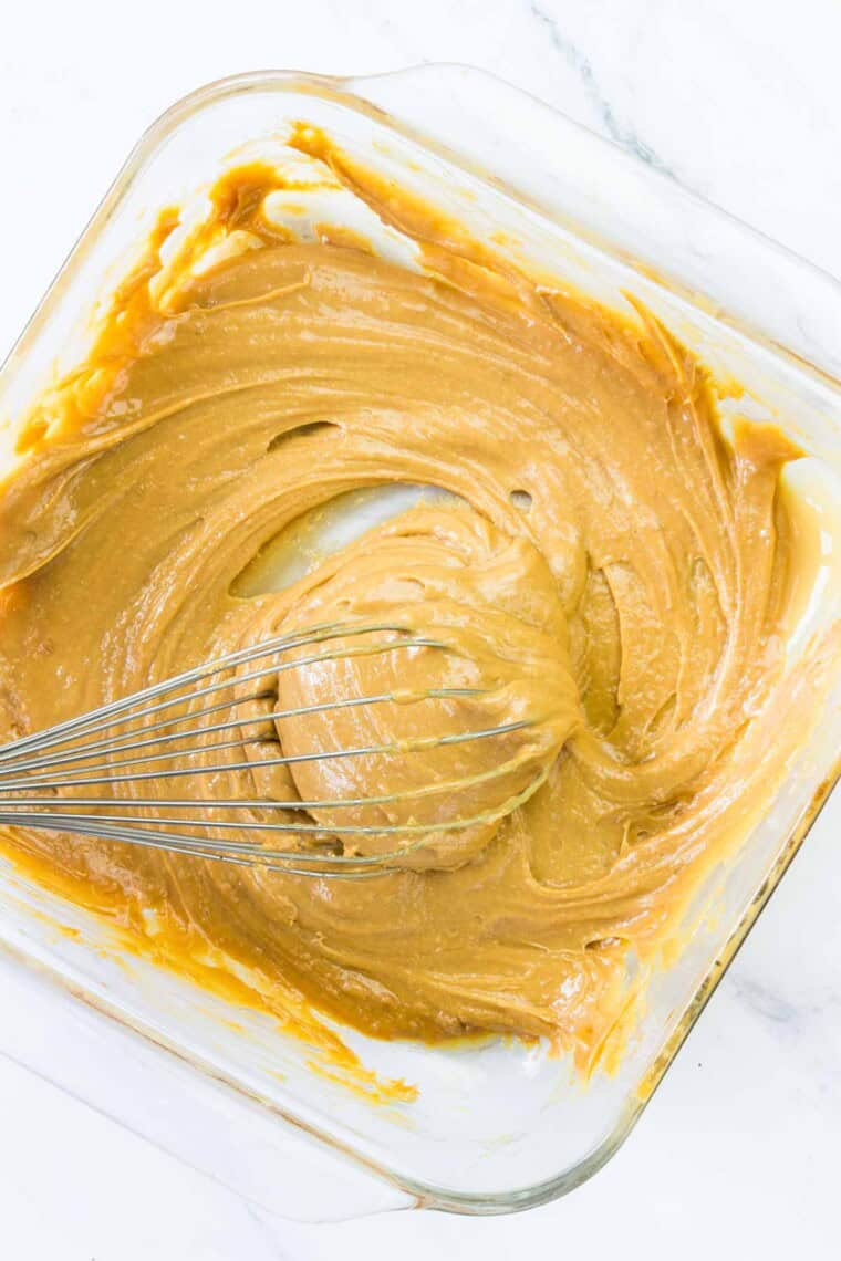 Whisking dulce de leche that's been cooked in the oven.