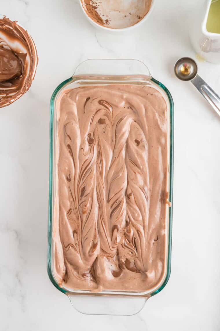 The ice cream is swirled in a loaf pan.