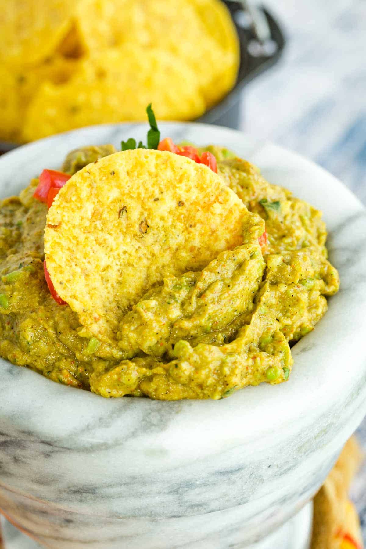 A corn chip digs into easy guacamole.