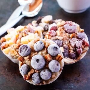 Berries top frozen oatmeal cups.