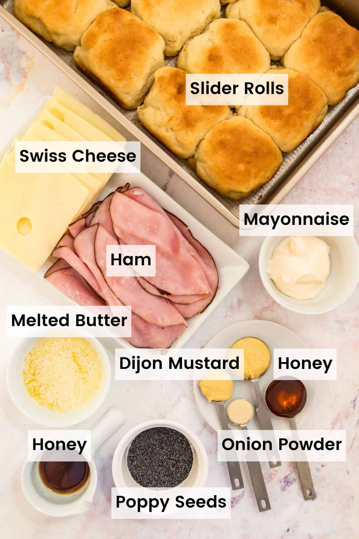 The ingredients for gluten-free ham and cheese sliders with text labels.