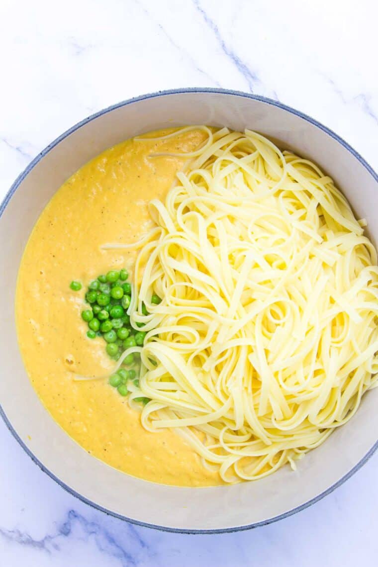 Noodles are added to the pumpkin sauce.