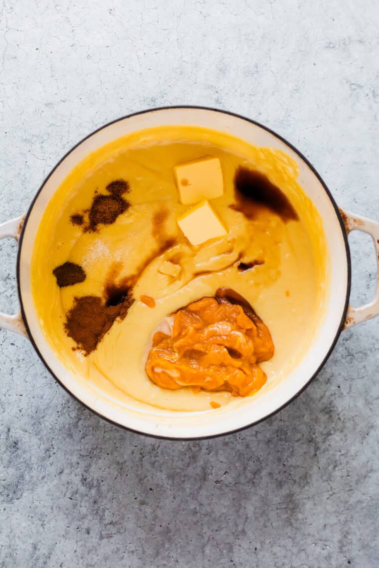 Butter, pumpkin, vanilla, and spices are added to the pudding mix.