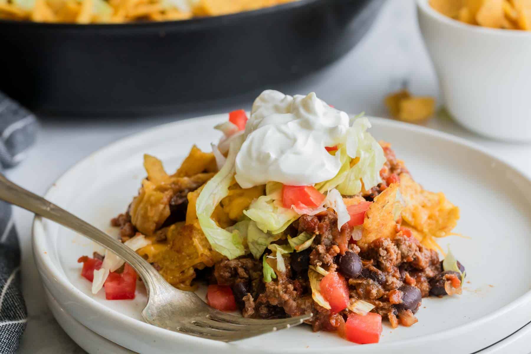 Walking Taco Casserole served on a plate.