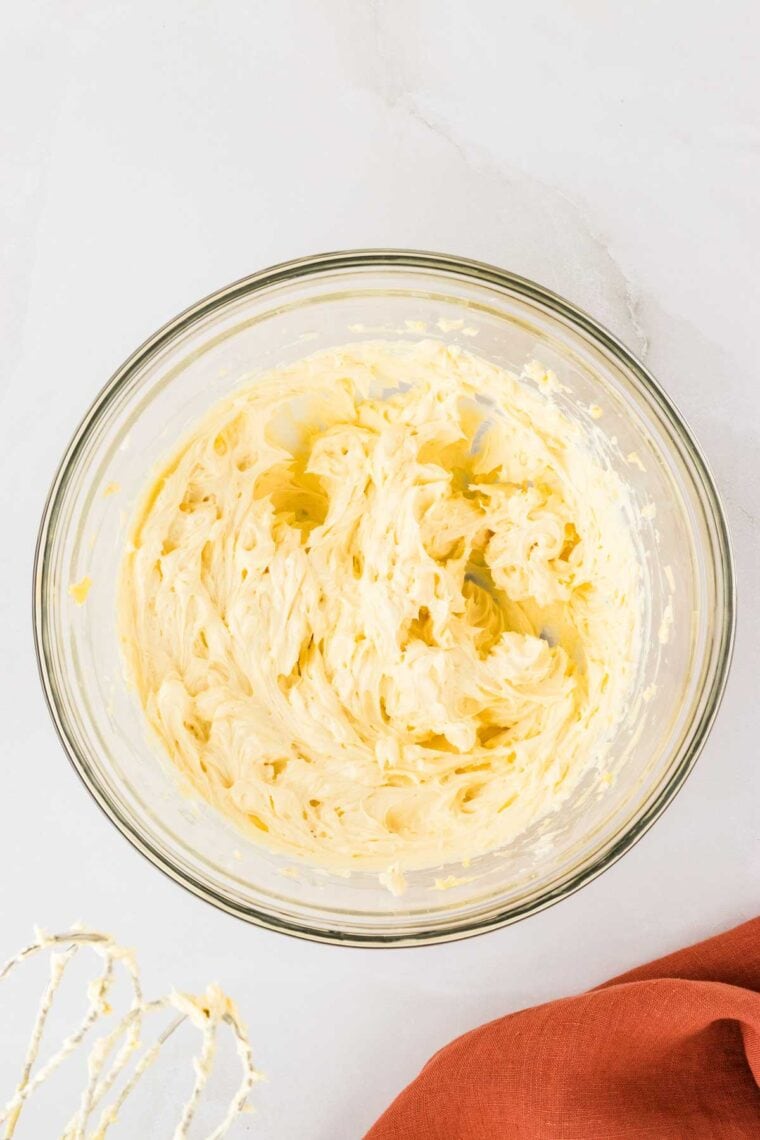 Creamed butter and cream cheese in a bowl.